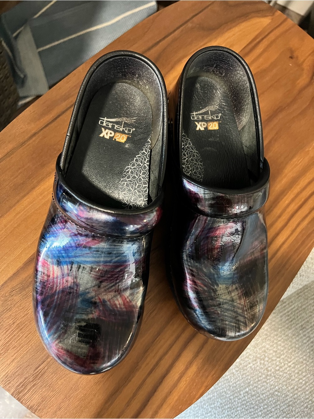 Dansko Painted Patent Leather Clogs in Black with Blue and Purple Accents